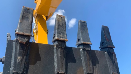 Зуб ковша мини-экскаватора Зуб ковша мини-экскаватора