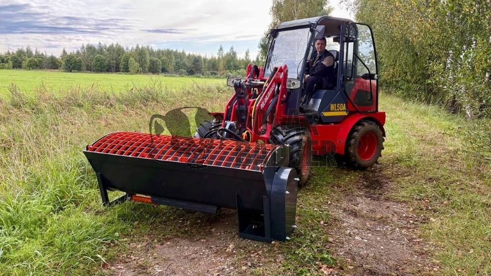 Работа бетоносмесительного ковша на погрузчике Polar Badger WL50 Работа бетоносмесительного ковша на погрузчике Polar Badger WL50